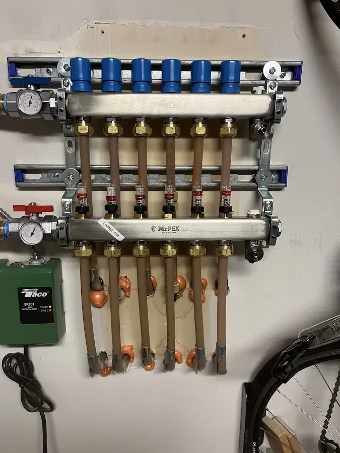 Plumber performing Water Heater Repair at a residential property in Hazle