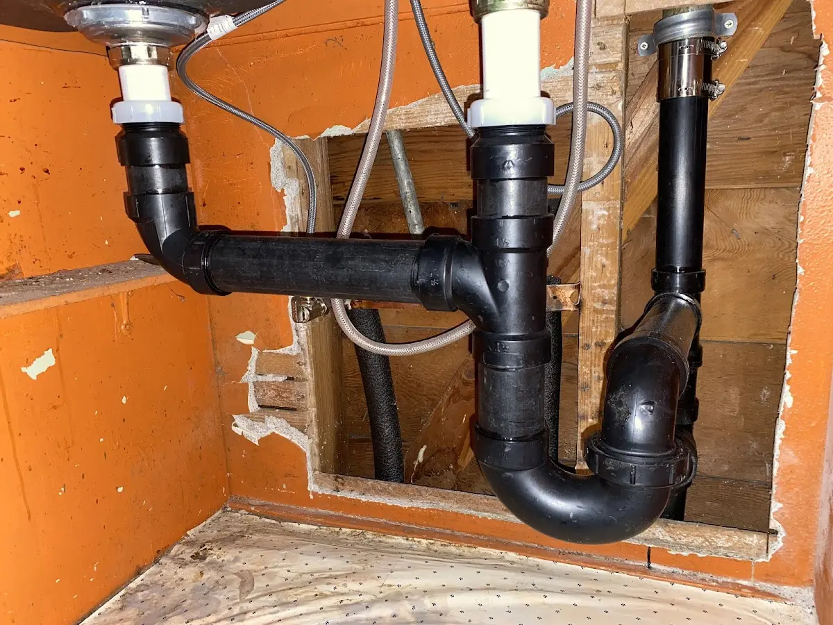 Professional Garbage Disposal Repair equipment and tools on the job in Hazle